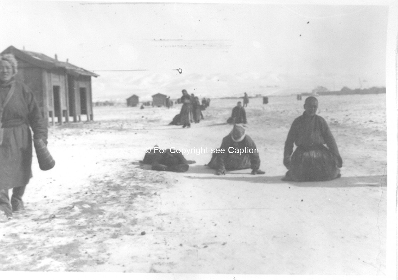 Prostration on the goroo circumambulation road. Film Archives K-24835